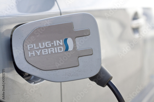 Photo: E-Auto / Hybridauto beim Laden E-Auto / Hybridauto beim Laden