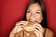 Woman eating burger