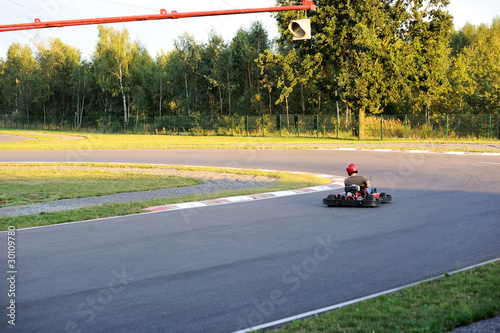 Photo: View of coutry autodrom in summer evening View of coutry autodrom in summer evening