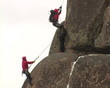 Rock climber zoom in cliff.