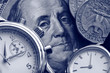 watch and portrait of Benjamin Franklin on hundred Dollar bill