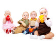 Babies group holding  peppers