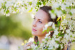 Beautiful woman among a blossom Beautiful woman among a blossom