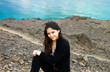 Portrait of beautiful girl on sea background