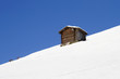 Alpine hut in winter