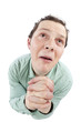 Photo: Cute man praying with puppy eyes Cute man praying with puppy eyes
