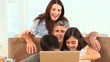 Video: A family looking at a laptop A family looking at a laptop