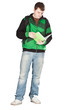 Photo: Student with backpack and notebook. Student with backpack and notebook.