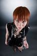 High angle view of fetish girl with chain