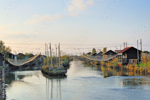Photo: Italy Cesenatico canal fishing net Italy Cesenatico canal fishing net