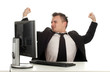 tired young businessman in black suit with computer