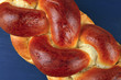 Photo: challah over blue painted wooden board challah over blue painted wooden board