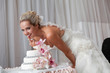 bride and a wedding cake