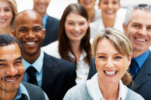 Photo: Attractive businesswoman with her team Attractive businesswoman with her team