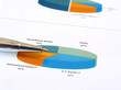 Pen on pie investment chart