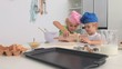 Brother and sister cooking together