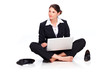 Young business woman sitting on the floor with laptop II