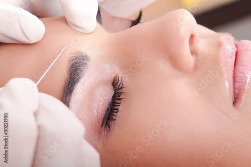 Photo: woman get a botox injection woman get a botox injection