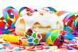 Foto: Berliner mit Zuckerguss und Tröten auf Konfetti Berliner mit Zuckerguss und Tröten auf Konfetti