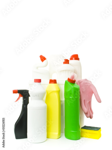 Photo: Plastic bucket with cleaning supplies on white background Plastic bucket with cleaning supplies on white background