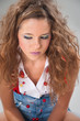 beautiful casual young teenage girl with makeup and coiffure