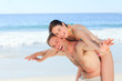 Woman with her husband on the beach