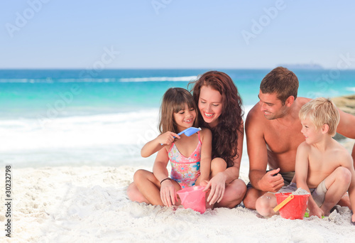 Photo: Portrait of a family at the beach Portrait of a family at the beach