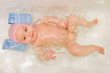 Cute baby swimming