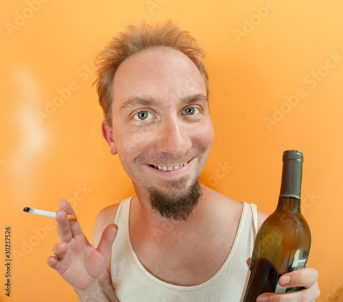 Photo: Man with alcohol and cigarette Man with alcohol and cigarette