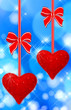 two read hearts hanging two read hearts hanging