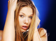 Foto: Pretty blond woman with headphones Pretty blond woman with headphones