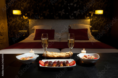 Photo: romantic dinner with champagne in the bedroom romantic dinner with champagne in the bedroom