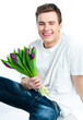 man with a bouquet of tulips man with a bouquet of tulips