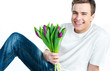 man with a bouquet of tulips man with a bouquet of tulips