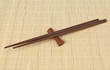 Chopsticks on bamboo tabletop Chopsticks on bamboo tabletop