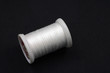 Reel whith white cotton thread Reel whith white cotton thread