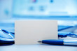 Modern business workplace, blank card for message