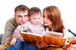 Parents reading to their kid