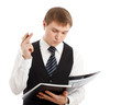 Man writing something in a folder.
