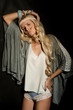 The blond girl on a gray background