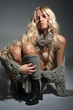 The blond girl on a gray background