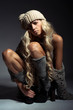 The blond girl on a gray background