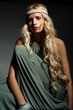 The blond girl on a gray background