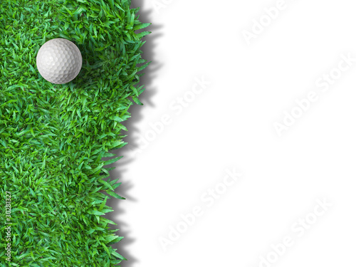 Photo: White golf ball on green grass isolated White golf ball on green grass isolated