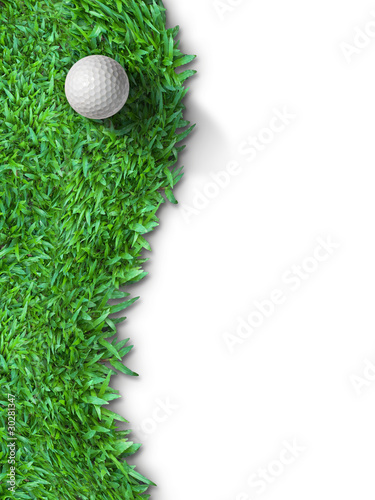 Photo: White golf ball on green grass isolated White golf ball on green grass isolated