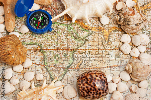 Photo: old map and compass old map and compass