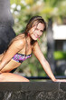 young beautiful woman relaxing near pool young beautiful woman relaxing near pool
