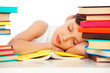 fatigued schoolgirl sleeping on book