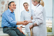 doctor shakes hands with a patient doctor shakes hands with a patient
