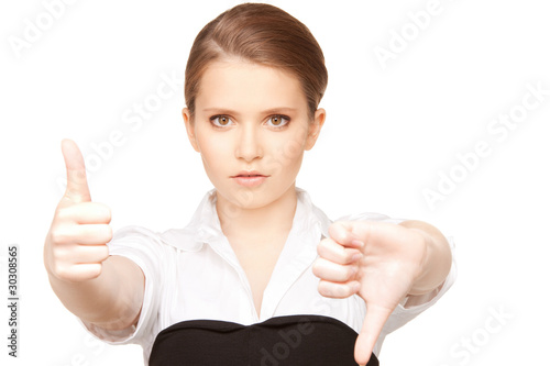 Photo: thumbs up and thumbs down thumbs up and thumbs down